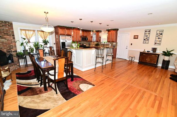 Dining room, Interior, Kitchen, Pendant Lights, Recessed Lighting, Stainless Steel Appliances, Stone Walls, Wood Texture Flooring