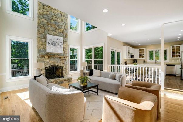 Fireplace, Interior, Living room, Recessed Lighting, Stone Walls, Wood Texture Flooring