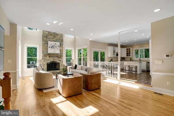 Fireplace, Interior, Kitchen, Living room, Recessed Lighting, Stone Walls, Wood Texture Flooring