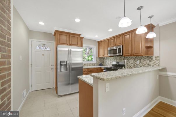 Interior, Kitchen, Pendant Lights, Recessed Lighting, Stainless Steel Appliances, Stone Walls, Wood Texture Flooring