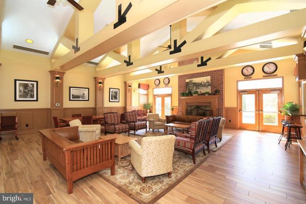 Fireplace, Interior, Living room, Recessed Lighting, Stone Walls, Wood Texture Flooring