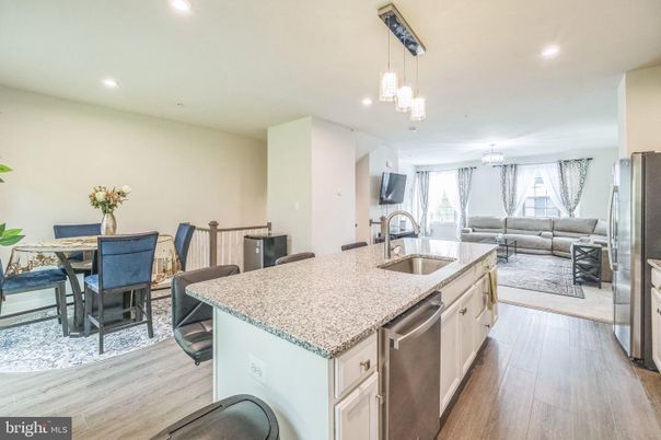 Chandelier, Dining room, Interior, Kitchen, Living room, Pendant Lights, Recessed Lighting, Wood Texture Flooring