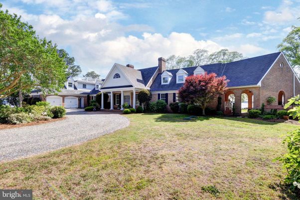 Attached, Backyard, Exterior, Facade, Brick Facade, French Provincial