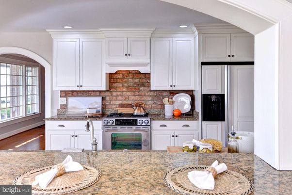 Interior, Kitchen, Recessed Lighting, Stainless Steel Appliances, Stone Walls, Wood Texture Flooring