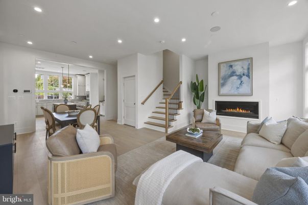 Dining room, Fireplace, Interior, Living room, Pendant Lights, Recessed Lighting, Wood Texture Flooring