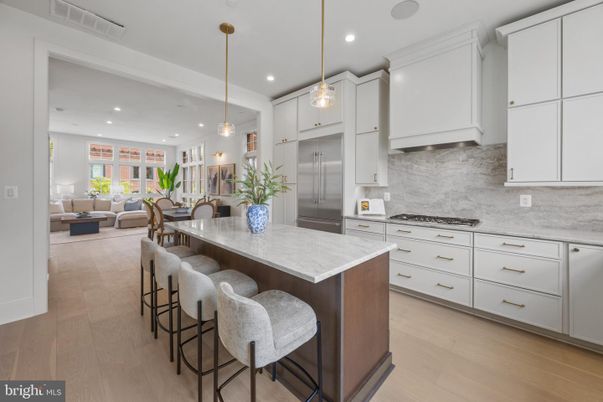 Dining room, Interior, Kitchen, Living room, Pendant Lights, Recessed Lighting, Stainless Steel Appliances, Wood Texture Flooring