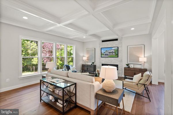 Fireplace, Interior, Living room, Recessed Lighting, Stone Walls, Wood Texture Flooring