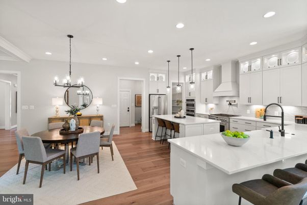 Chandelier, Dining room, Interior, Kitchen, Pendant Lights, Recessed Lighting, Stainless Steel Appliances, Wood Texture Flooring