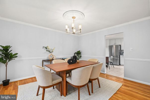 Chandelier, Dining room, Interior, Kitchen, Stainless Steel Appliances, Wood Texture Flooring
