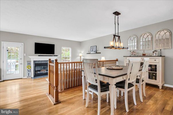 Dining room, Fireplace, Interior, Pendant Lights, Wood Texture Flooring