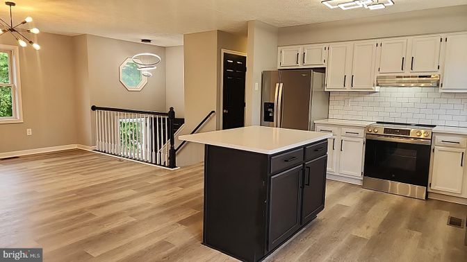 Interior, Kitchen, Pendant Lights, Stainless Steel Appliances, Wood Texture Flooring