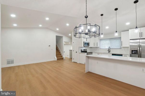 Interior, Kitchen, Pendant Lights, Recessed Lighting, Stainless Steel Appliances, Wood Texture Flooring