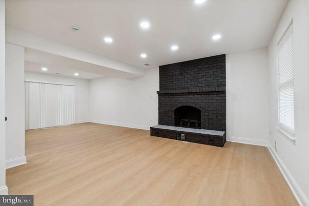 Empty room, Fireplace, Interior, Recessed Lighting, Wood Texture Flooring