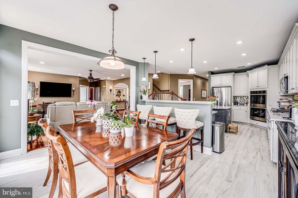 Dining room, Interior, Kitchen, Living room, Pendant Lights, Recessed Lighting, Stainless Steel Appliances, Wood Texture Flooring