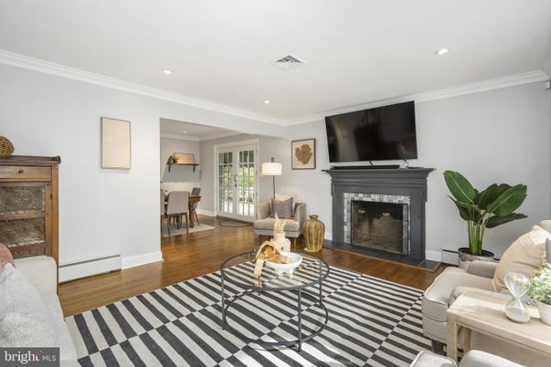 Dining room, Fireplace, Interior, Living room, Recessed Lighting, Wood Texture Flooring