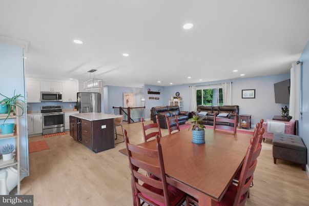 Dining room, Interior, Kitchen, Living room, Recessed Lighting, Stainless Steel Appliances, Wood Texture Flooring