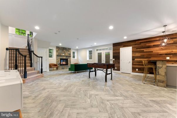 Billiard Table, Fireplace, Game Room, Interior, Pendant Lights, Recessed Lighting, Wood Texture Flooring, Wooden Walls