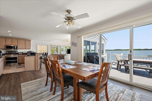Dining room, Interior, Kitchen, Recessed Lighting, Stainless Steel Appliances, Water, Wood Texture Flooring