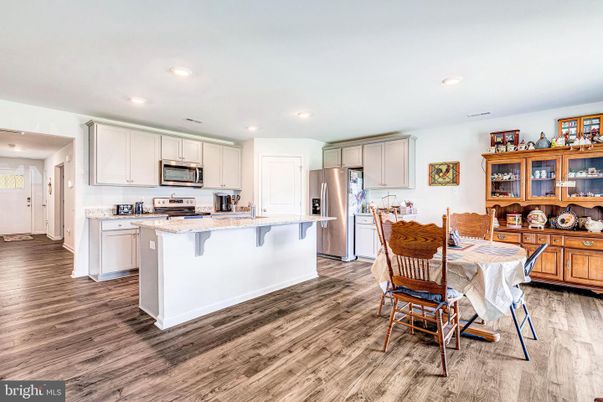 Dining room, Interior, Kitchen, Recessed Lighting, Stainless Steel Appliances, Wood Texture Flooring