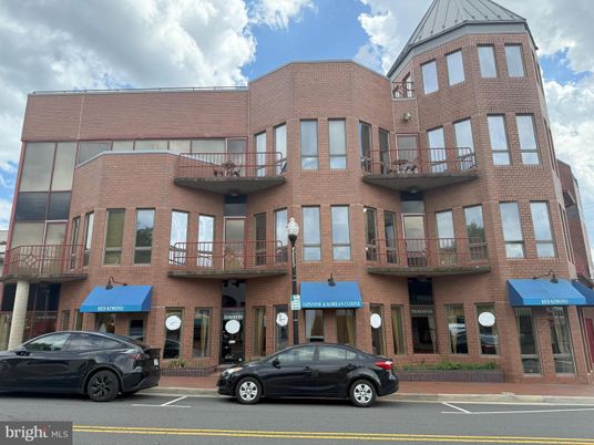 Exterior, Facade, Brick Facade, Condo Building