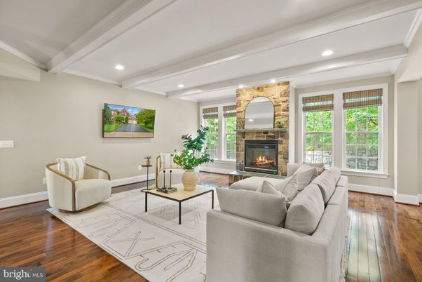 Fireplace, Interior, Living room, Recessed Lighting, Stone Walls, Wood Texture Flooring
