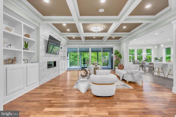 Dining room, Fireplace, Interior, Living room, Recessed Lighting, Wood Texture Flooring