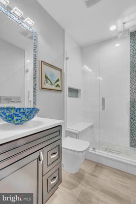 Bathroom, Glass Shower, Interior, Recessed Lighting, Wood Texture Flooring