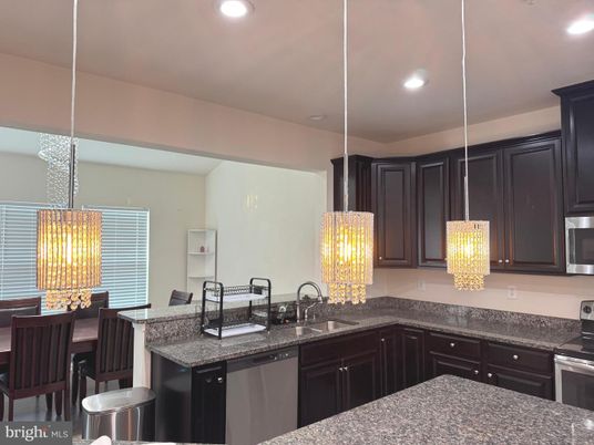 Chandelier, Dining room, Interior, Kitchen, Pendant Lights, Recessed Lighting, Stainless Steel Appliances