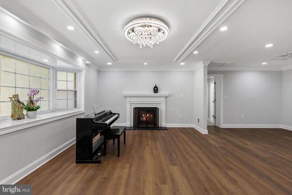 Chandelier, Fireplace, Interior, Piano, Recessed Lighting, Wood Texture Flooring