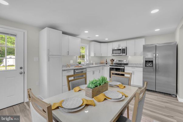 Dining room, Interior, Kitchen, Recessed Lighting, Stainless Steel Appliances, Wood Texture Flooring
