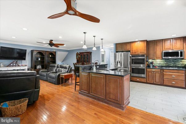 Dining room, Interior, Kitchen, Living room, Pendant Lights, Recessed Lighting, Stainless Steel Appliances, Wood Texture Flooring