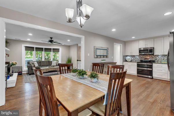 Dining room, Interior, Kitchen, Living room, Pendant Lights, Recessed Lighting, Stainless Steel Appliances, Wood Texture Flooring