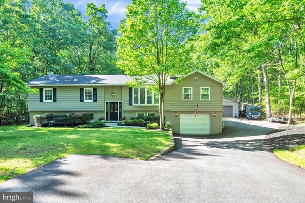 Attached, Exterior, Facade, Raised Ranch