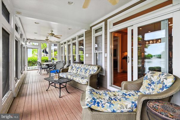 Dining room, Interior, Living room, Recessed Lighting, Sun Room, Water, Wood Texture Flooring