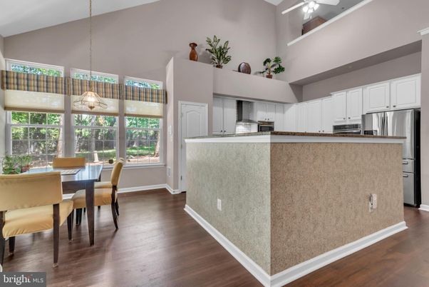 Dining room, Interior, Kitchen, Pendant Lights, Stainless Steel Appliances, Wood Texture Flooring