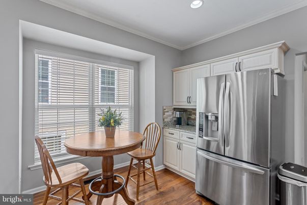 Dining room, Interior, Kitchen, Recessed Lighting, Stainless Steel Appliances, Wood Texture Flooring