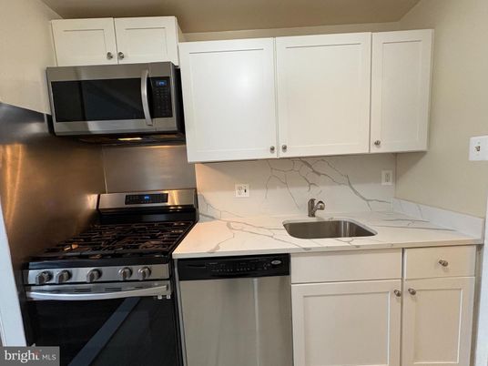 Interior, Kitchen, Marble Walls, Stainless Steel Appliances