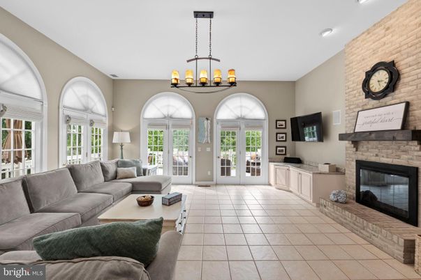 Chandelier, Fireplace, Interior, Living room, Recessed Lighting, Stone Walls