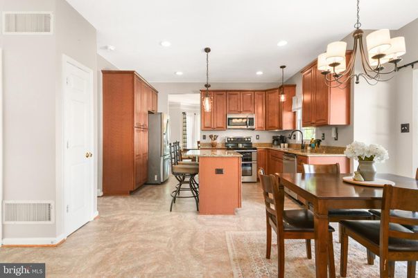 Chandelier, Dining room, Interior, Kitchen, Pendant Lights, Recessed Lighting, Stainless Steel Appliances