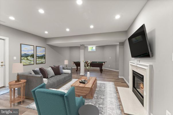 Billiard Table, Fireplace, Game Room, Interior, Living room, Recessed Lighting, Wood Texture Flooring