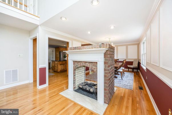 Chandelier, Dining room, Fireplace, Interior, Recessed Lighting, Wood Texture Flooring