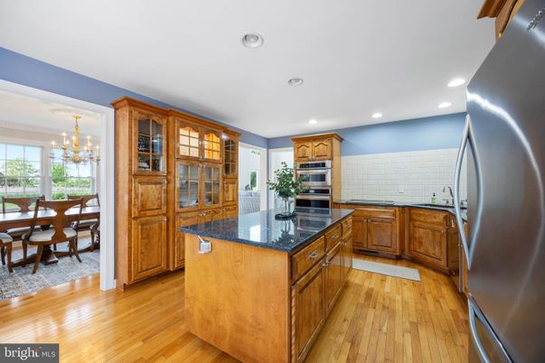 Chandelier, Dining room, Interior, Kitchen, Recessed Lighting, Stainless Steel Appliances, Wood Texture Flooring