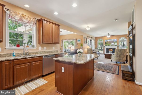 Fireplace, Interior, Kitchen, Living room, Recessed Lighting, Wood Texture Flooring