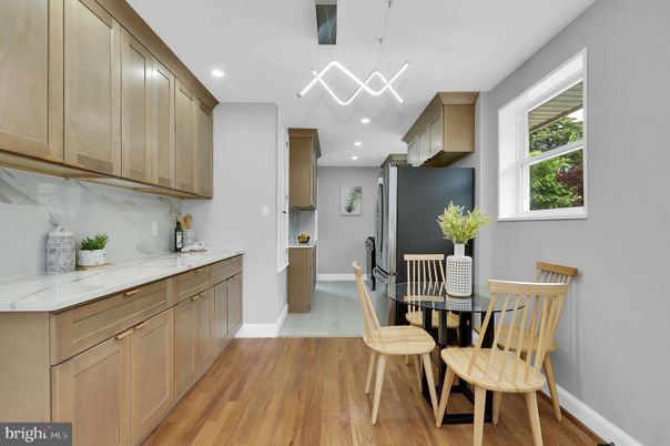Dining room, Interior, Kitchen, Marble Walls, Pendant Lights, Recessed Lighting, Wood Texture Flooring