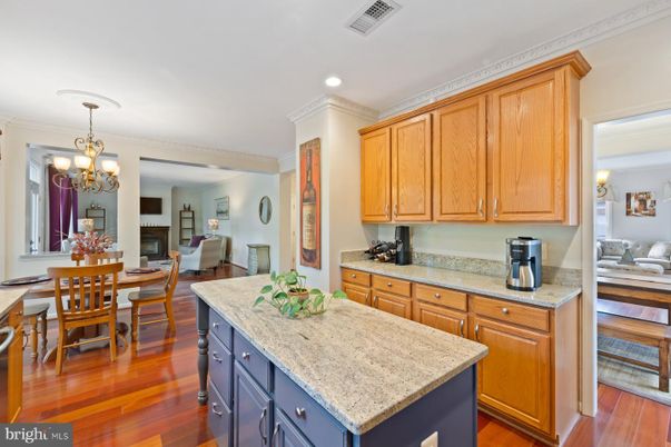 Chandelier, Dining room, Fireplace, Interior, Recessed Lighting, Wood Texture Flooring
