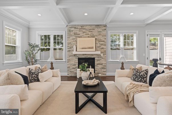 Fireplace, Interior, Living room, Recessed Lighting, Stone Walls, Wood Texture Flooring