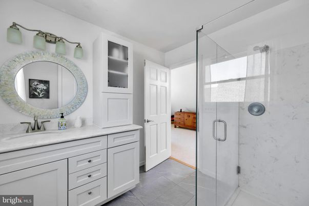 Bathroom, Dual Sink Vanities, Glass Shower, Interior, Marble Walls