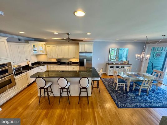 Chandelier, Dining room, Interior, Kitchen, Recessed Lighting, Stainless Steel Appliances, Wood Texture Flooring
