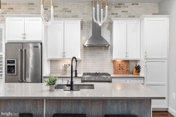 Interior, Kitchen, Pendant Lights, Stainless Steel Appliances, Stone Walls, Wood Texture Flooring