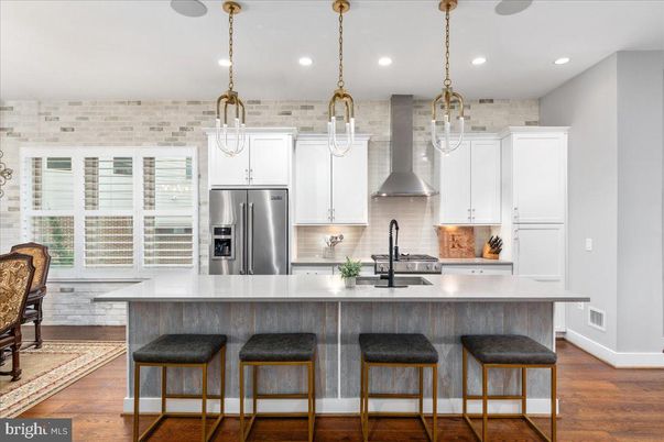 Interior, Kitchen, Pendant Lights, Recessed Lighting, Stainless Steel Appliances, Stone Walls, Wood Texture Flooring